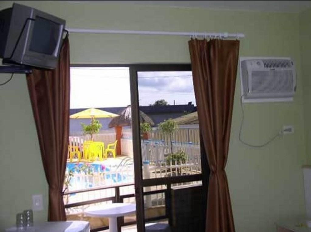 Hotel Pousada Mineirinho Balneário Praia do Leste Pokoj fotografie